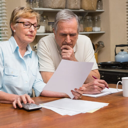 Senior couple looking over their end of life planning for National Healthcare Decision day.