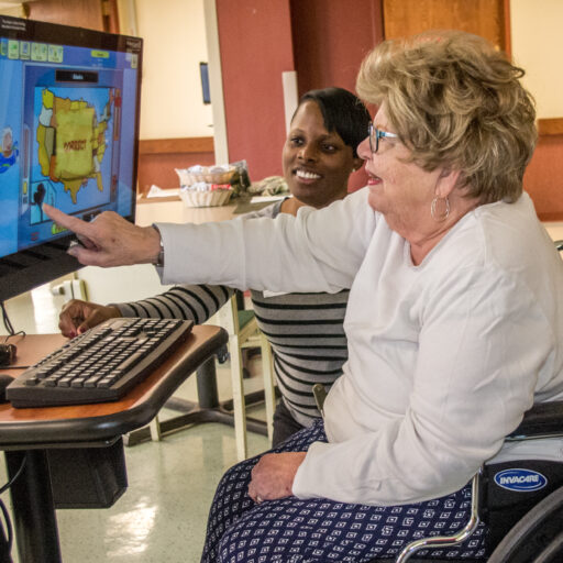 Bethesda resident Patricia Stirlen using the iN2L computer system for seniors at Bethesda Meadow.