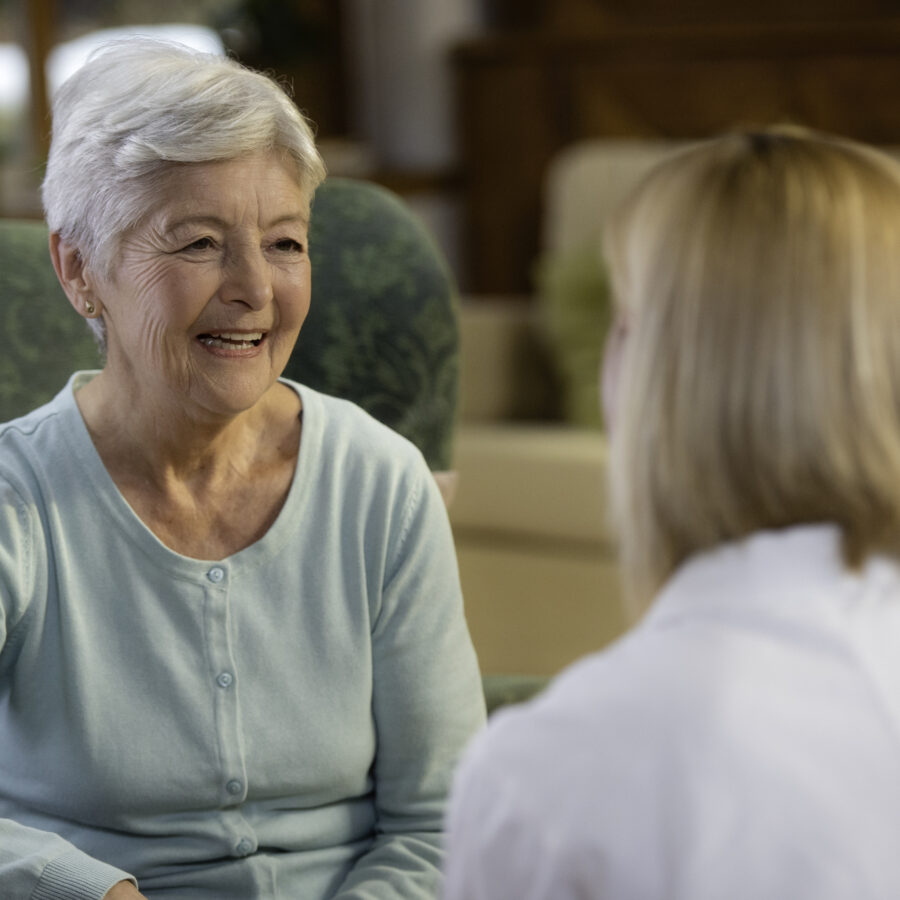 A geriatric care managers benefit seniors and their caregivers. Here, a senior woman speaks with her geriatric care manager.