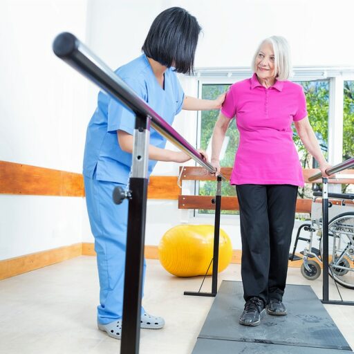 A senior woman during rehabilitation and physical therapy, which are vital to the senior healing process after an injury.