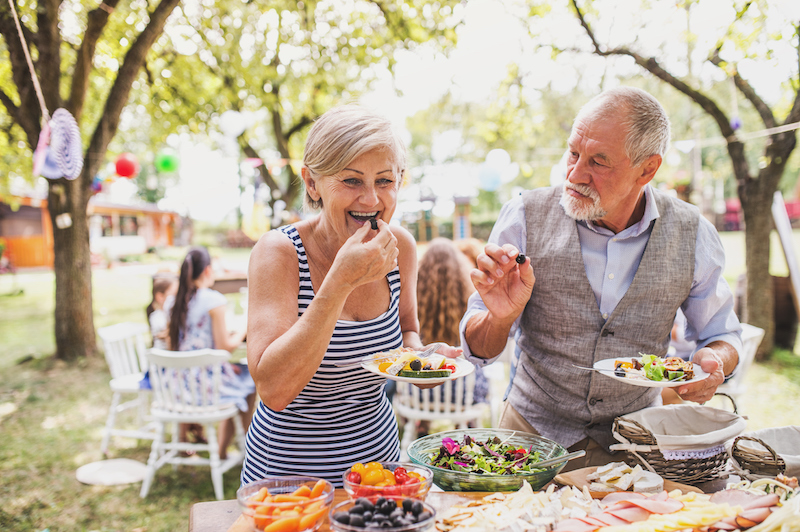 A well-balanced and easy diet for seniors isn't as hard as you might think! Keep it simple, add variety, and try to eat more whole foods, like this senior couple is demonstrating.