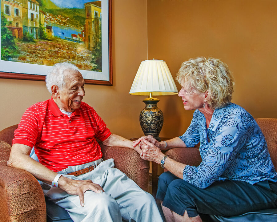 Volunteering at a senior care facility brings joy to seniors and volunteers. Here, a Bethesda volunteer comforts a senior resident.