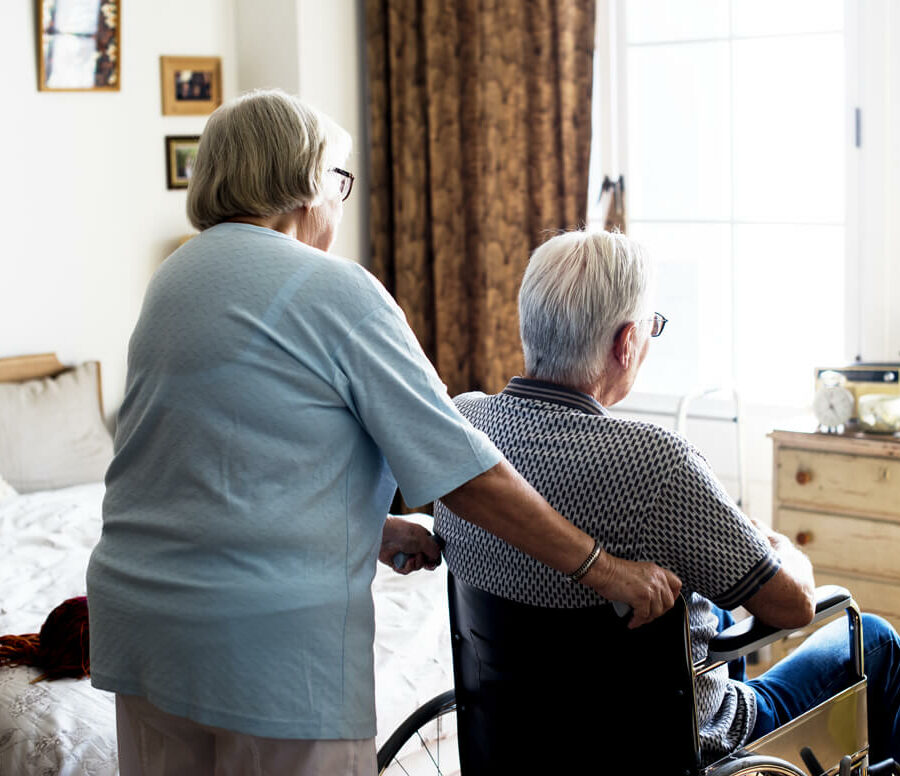 A senior couple, as the wife provides care for her husband. As the challenge of caregiving becomes more difficult and as your spouse's condition worsens, it may be time to find long-term care.