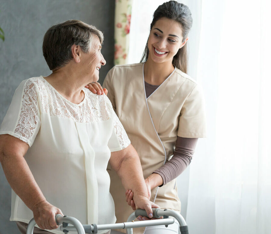 Planning ahead for assisted living or other long-term care options allows seniors, like this woman, to find the care that they need without feeling rushed. Here, a nurse chats with a senior woman at an Assisted Living community.