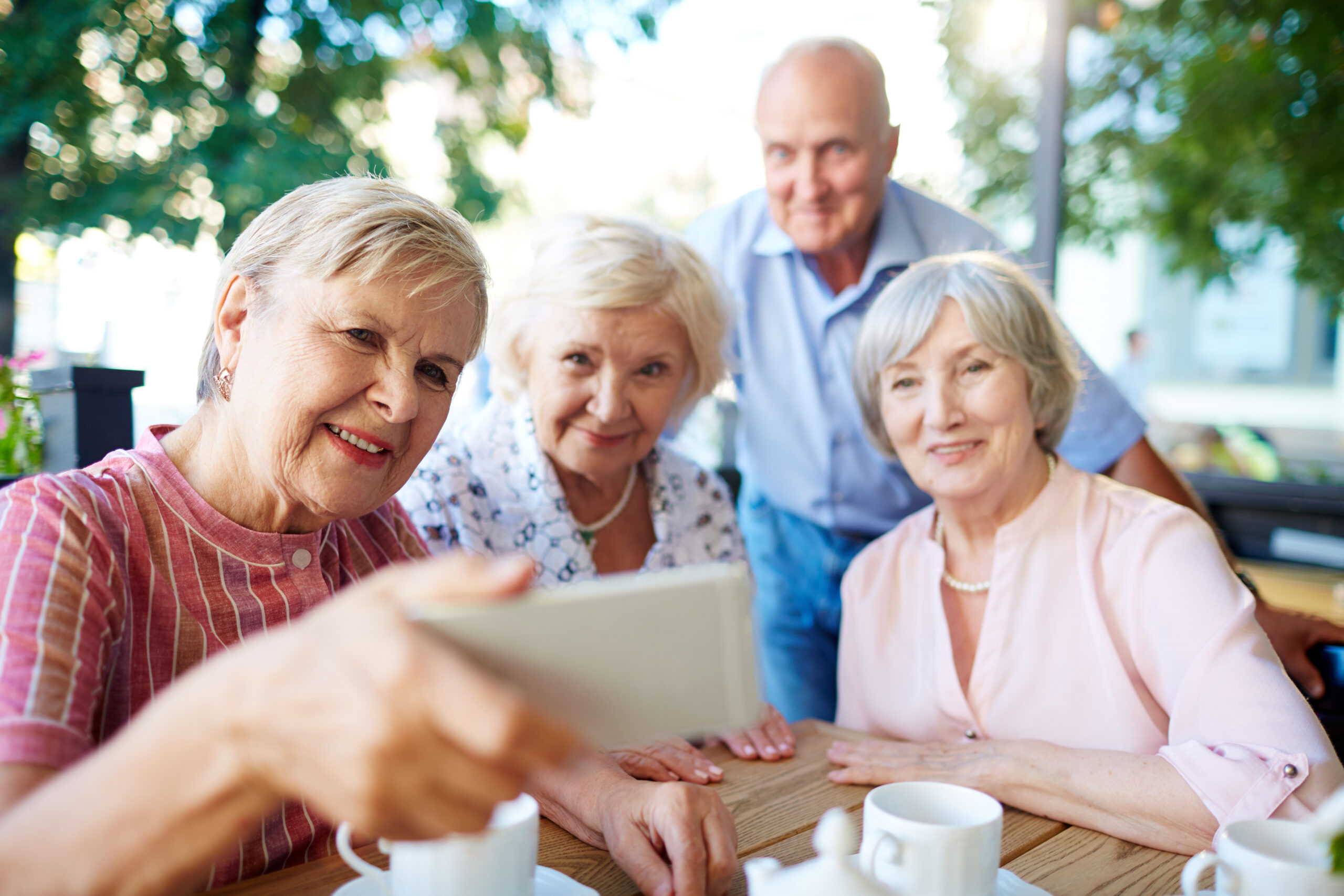 A group of seniors gathered to make friends at a retirement community