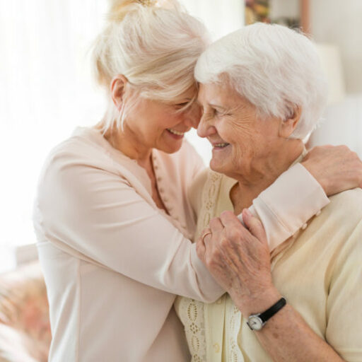 A woman has fun caregiving for her senior mother.