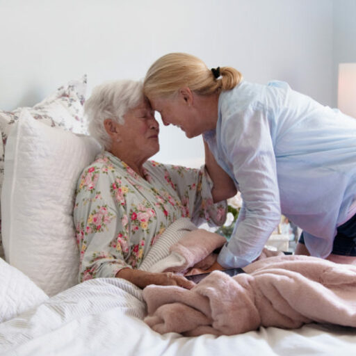 Hospice care is a gift, as it allows moments like these. A senior woman and her daughter spend quality time together.