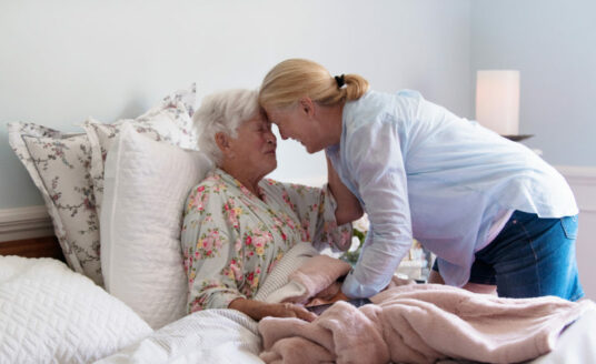 Hospice care is a gift, as it allows moments like these. A senior woman and her daughter spend quality time together.