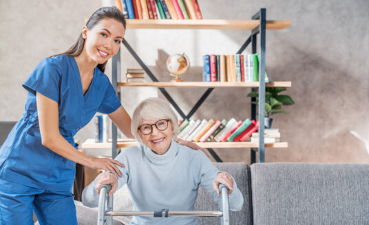 nurse helping senior in order to prevent common home accidents