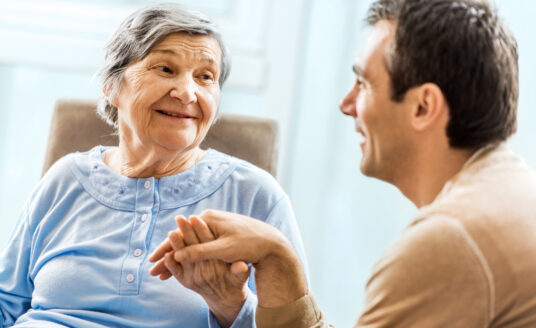 Adult son able to manage dementia communication with senior mother.