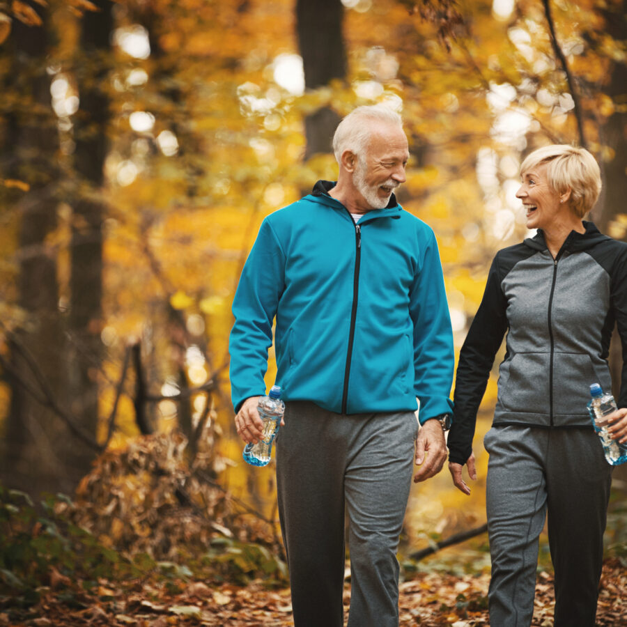 Senior couple walking | Autumn activities for seniors