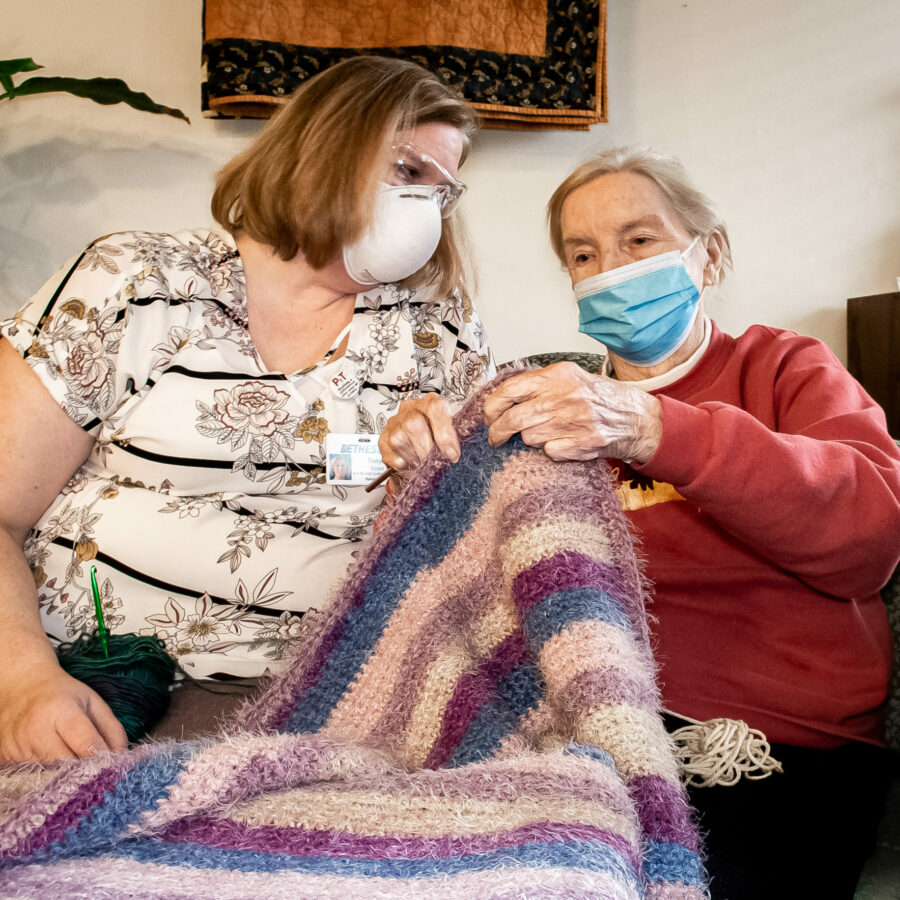 Evelyn Elmore shares her love of crocheting with Tonya Grant at Alton Memorial Rehabilitation & Therapy.