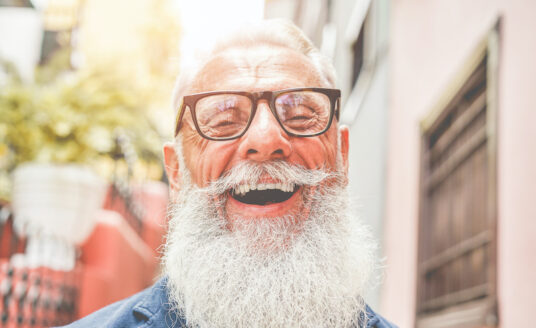 A senior man smiling and laughing | jokes for seniors