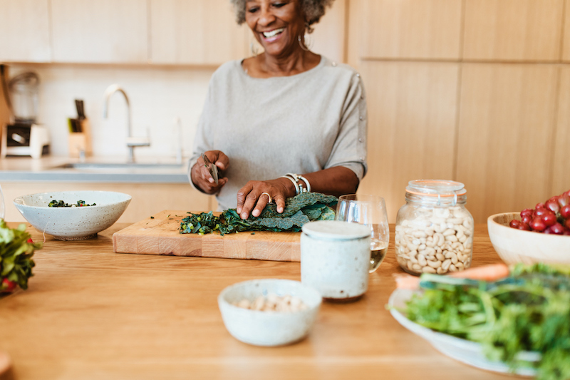 Senior woman eating healthy with a delicious recipe