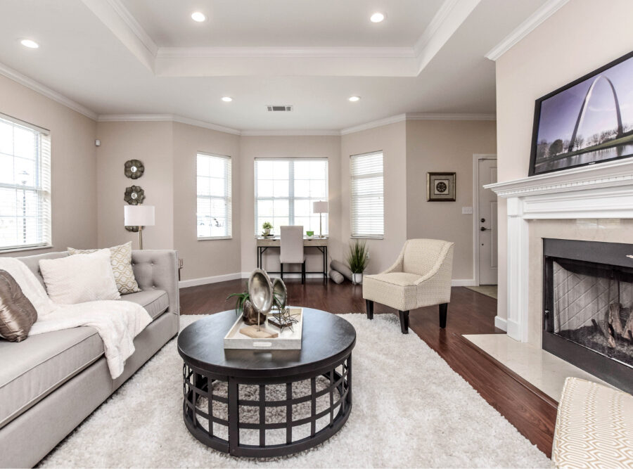 A photo of a property at The Oaks with modern paint, recessed lighting and a fireplace