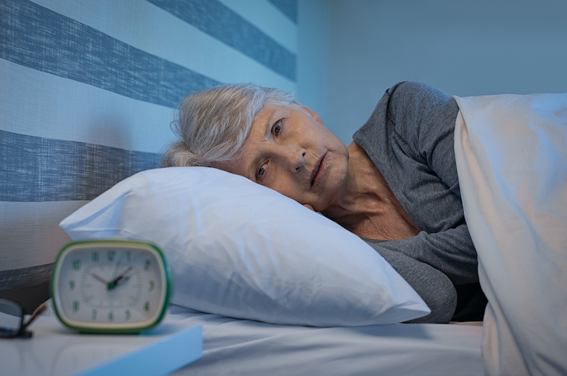 Senior woman experiencing sleep concerns