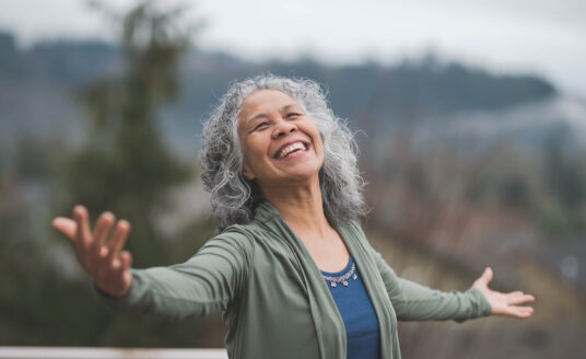 A senior woman lives her best year yet as she explores the outdoors, a healthy habit for seniors.