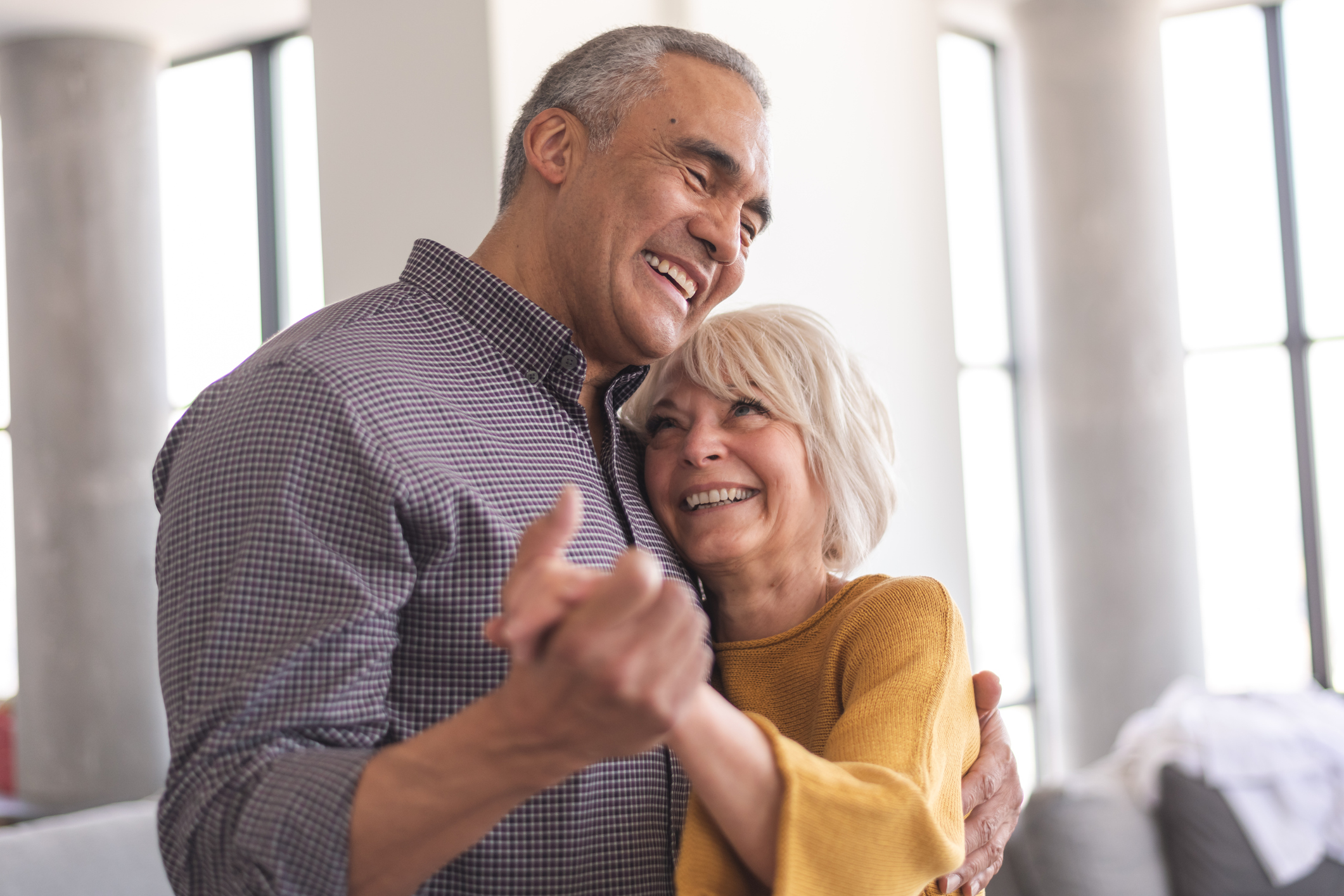 couple dancing in their new senior community