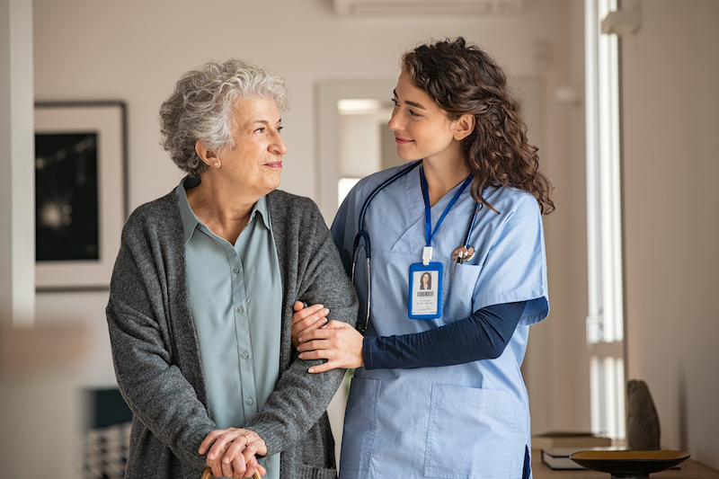 caregiver talking to older woman about bladder health