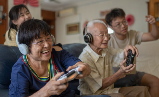 senior couple playing video games to keep your brain sharp