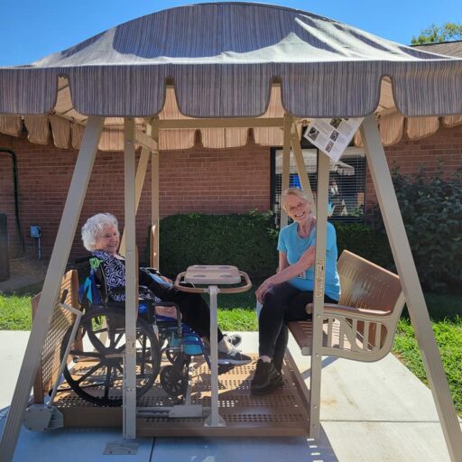 Southgate residents and loved ones enjoy the new Whisper Glider