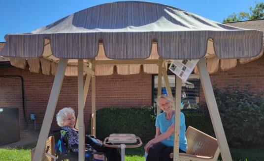 Southgate residents and loved ones enjoy the new Whisper Glider