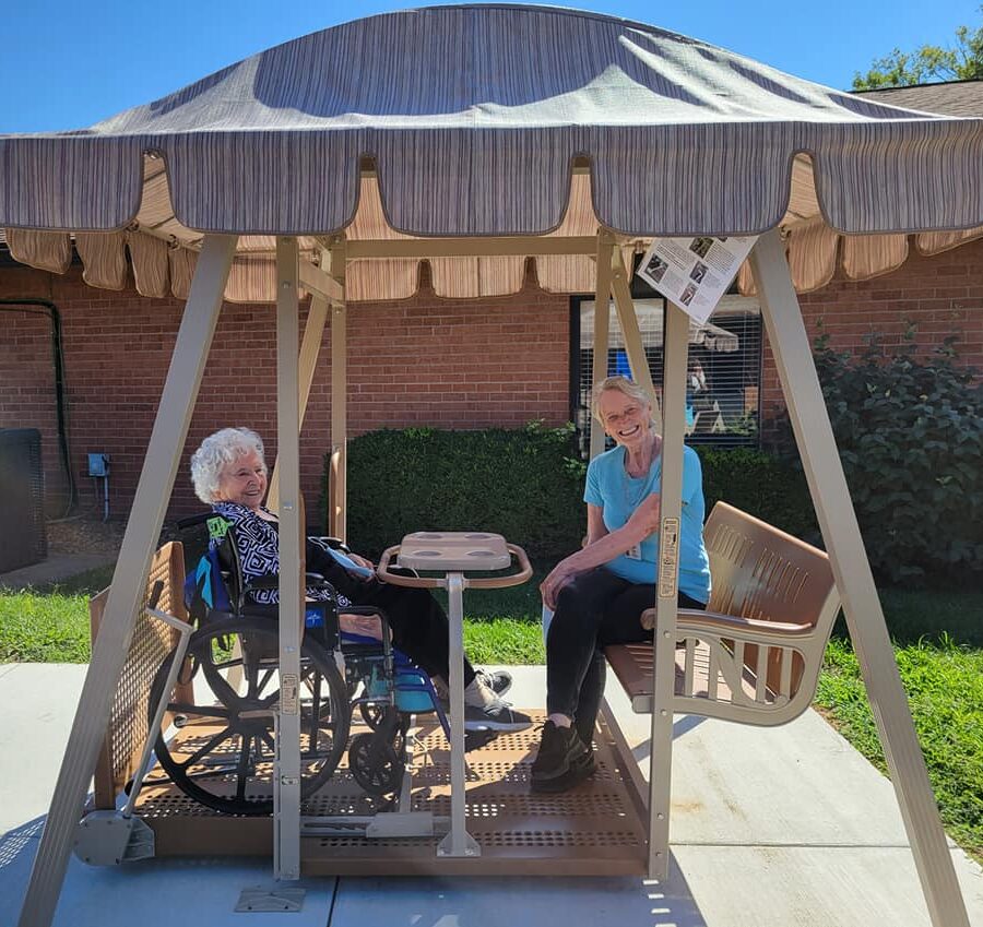 Southgate residents and loved ones enjoy the new Whisper Glider