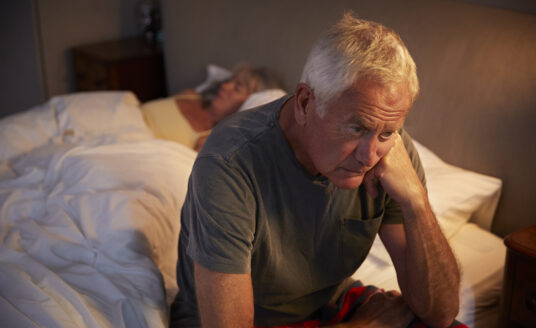 Senior Man Dealing with Sleep Challenges