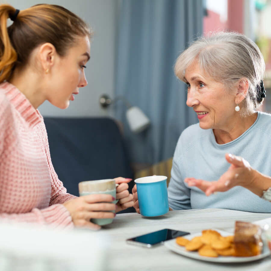 Senior mother and daughter discussing advanced care planning