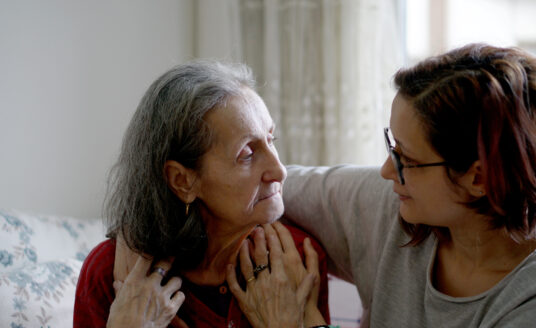 Family member speaking to senior loved one with dementia | How to Talk to Someone with Dementia