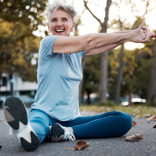 Woman performing hip stretches for seniors