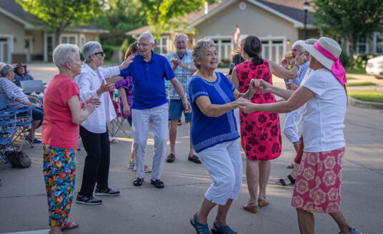 Oaks residents at annual block party for Hearts for Our Homes