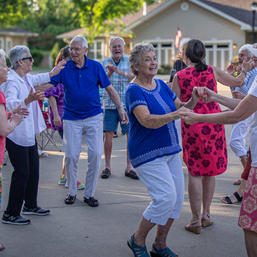 Oaks residents at annual block party for Hearts for Our Homes