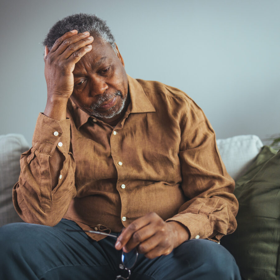 Worried senior man suffering with anxiety disorders in older adults