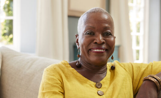 Senior woman smiling portraying the power of positivity