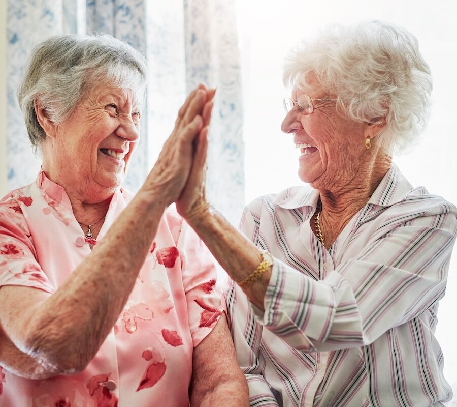 Happy, love and senior women with a high five for care