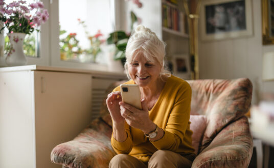 Woman utilizing social media safety tips to scroll on her phone