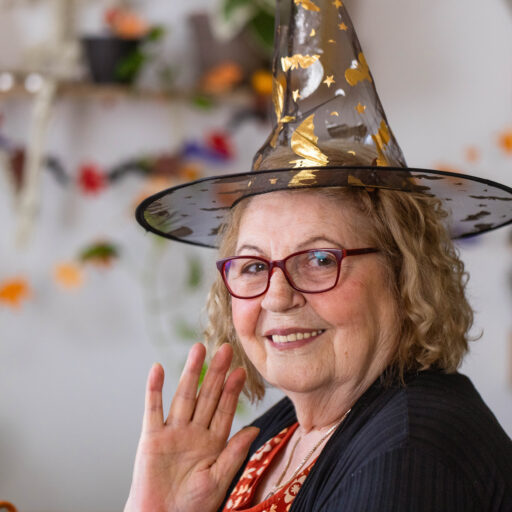 Senior woman dressed as witch for Halloween - Bethesda Health Group Senior woman dressed as witch, showcasing easy Halloween costumes for seniors