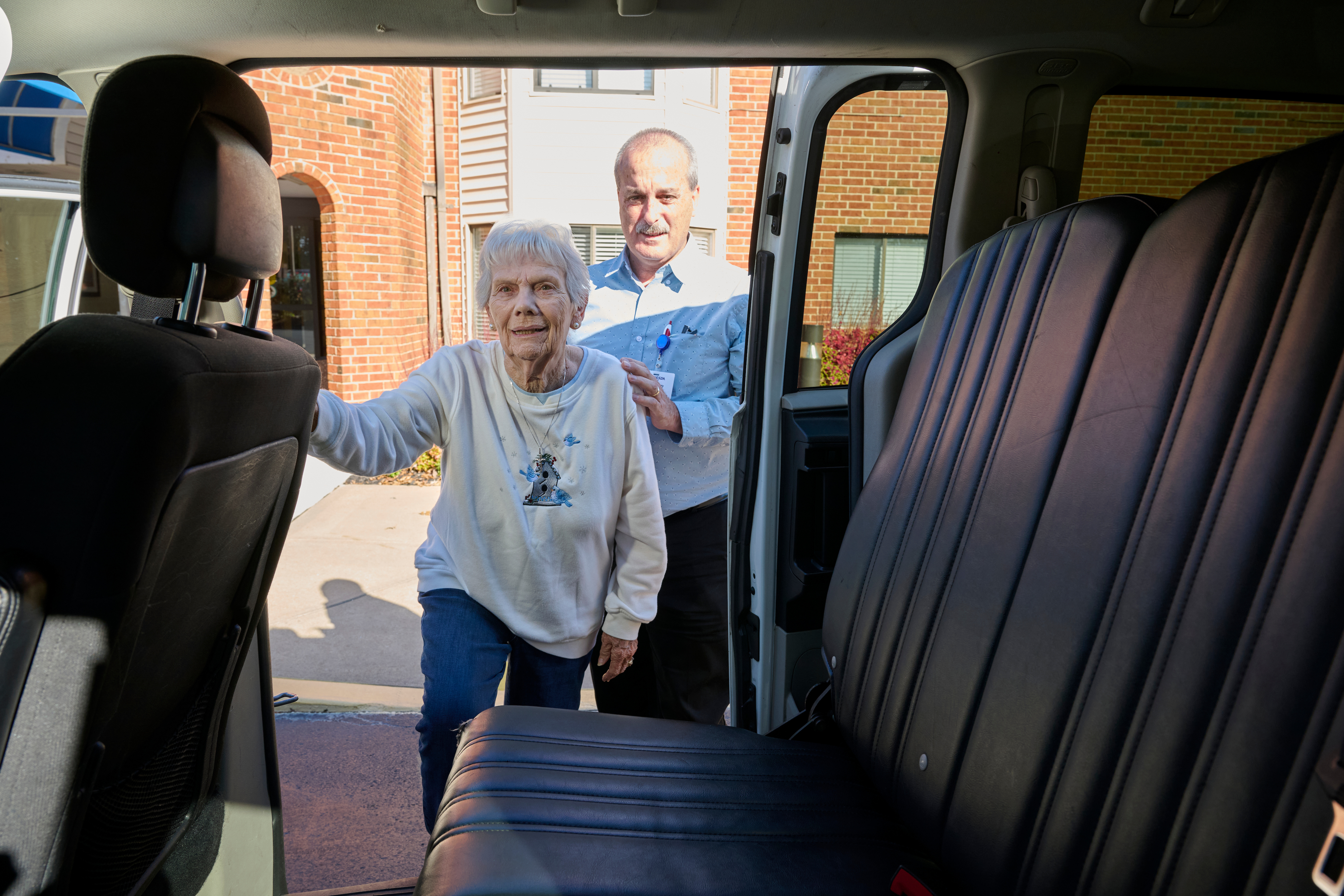 Bethesda Terrace resident getting in transportation van