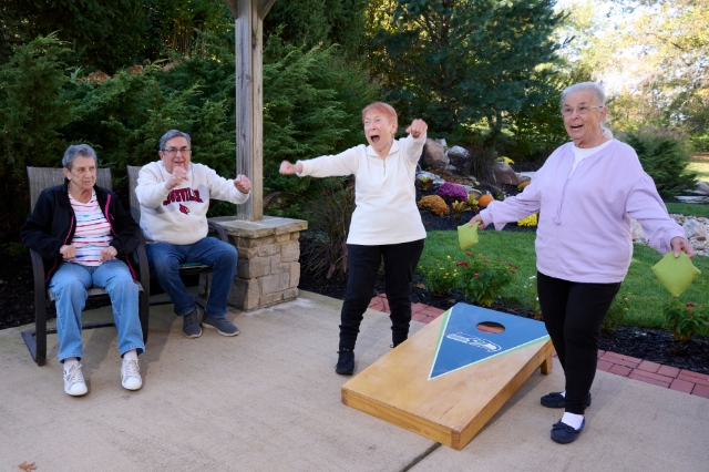 Seniors play a yard game and cheering